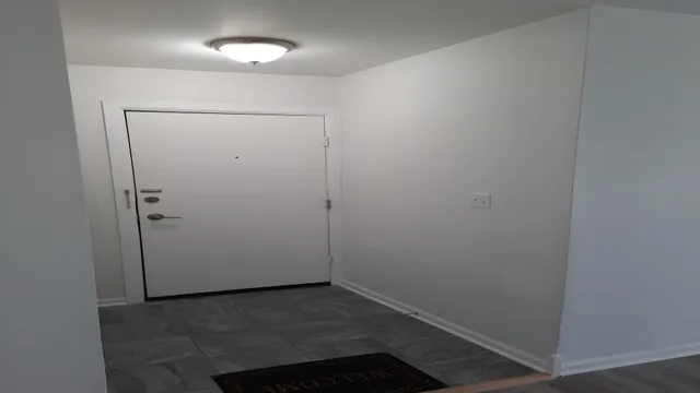 an empty room with a workbench