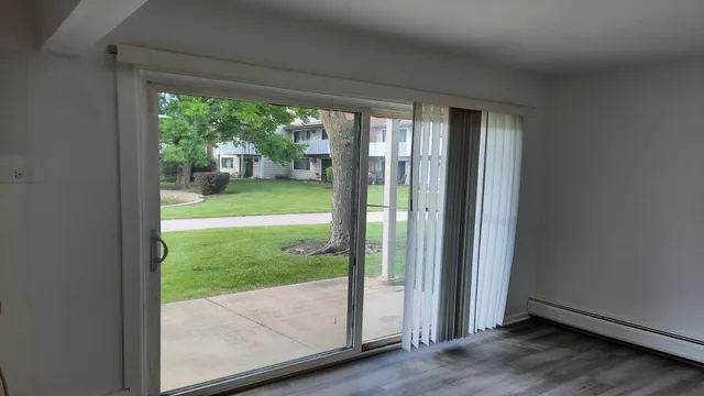a view of a room with yard from a window
