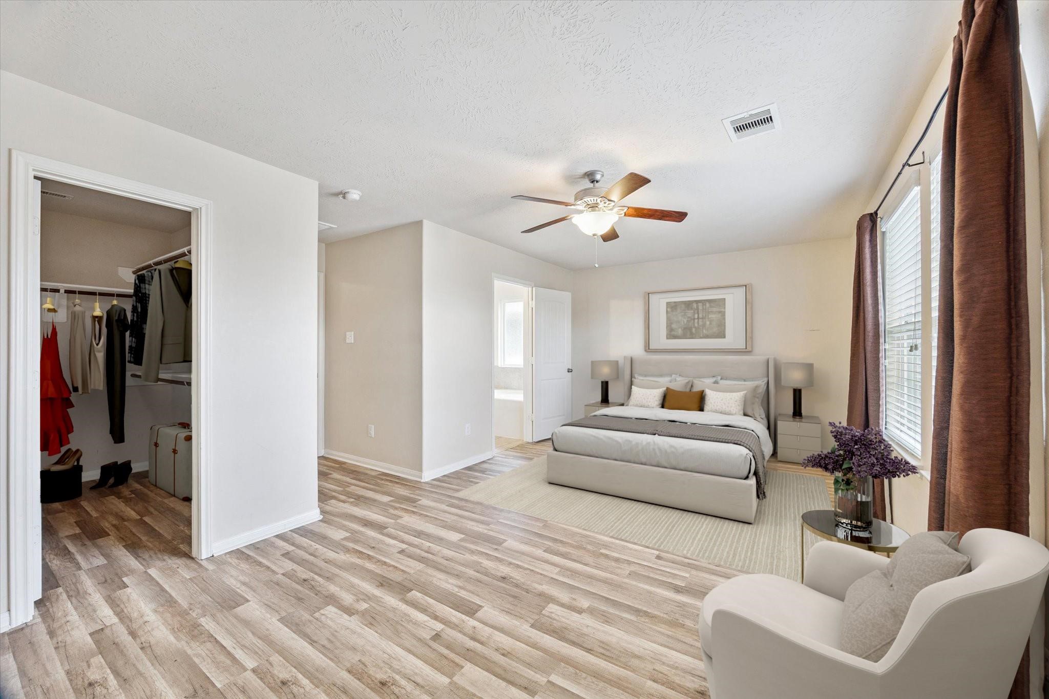 11718 Red Hummingbird Drive Houston, TX 77047 - Photo 5 of 13 a living room with furniture and a chandelier