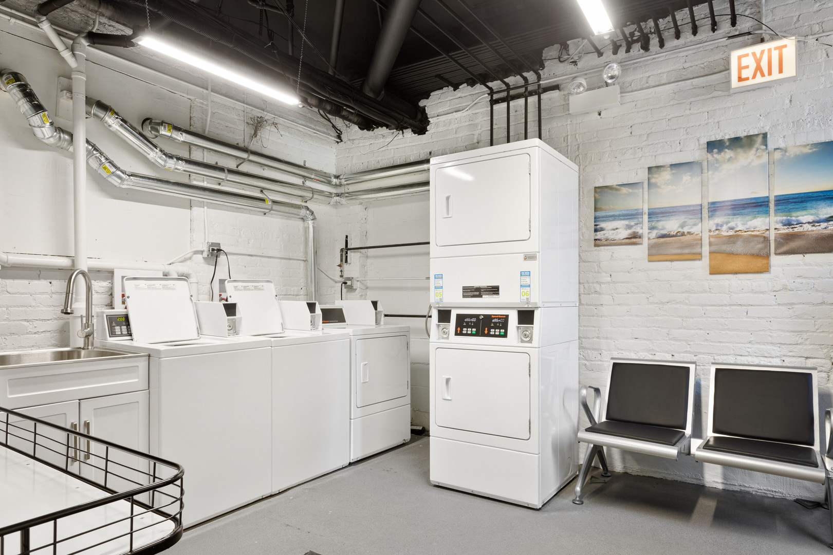 1651 West Jonquil Terrace, Unit 8 Chicago, IL 60626 - Photo 17 of 17 a view of a storage & utility room with sink dryer and washer