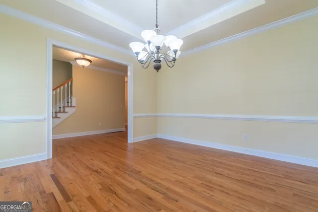a view of a balcony with wooden floor