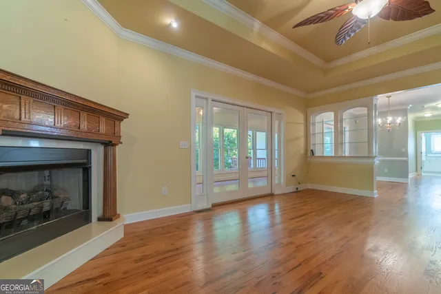 a kitchen with stainless steel appliances granite countertop a refrigerator and cabinets
