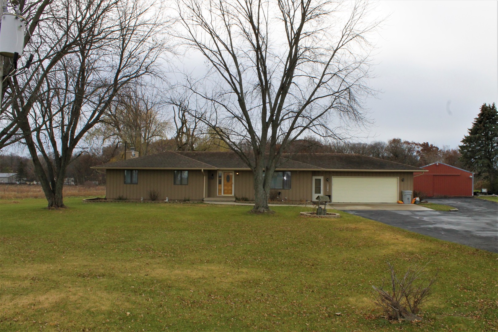 front view of a house with a yard