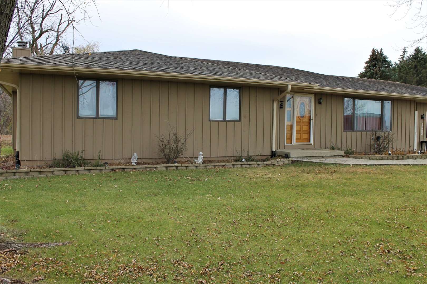 8776 Wolf Road Kingston, IL 60145 - Photo 2 of 35 a front view of house with yard