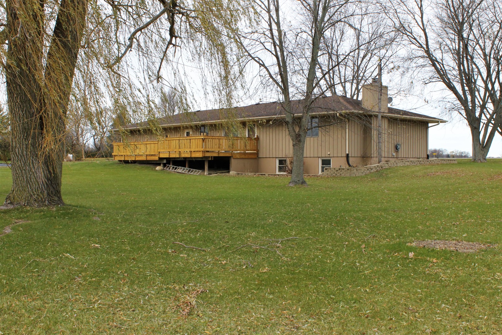 8776 Wolf Road Kingston, IL 60145 - Photo 29 of 35 a view of a house with a yard