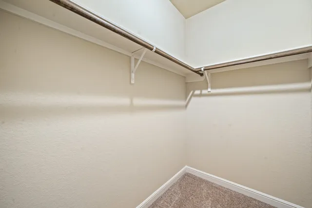 a bathroom with a sink a mirror and a toilet