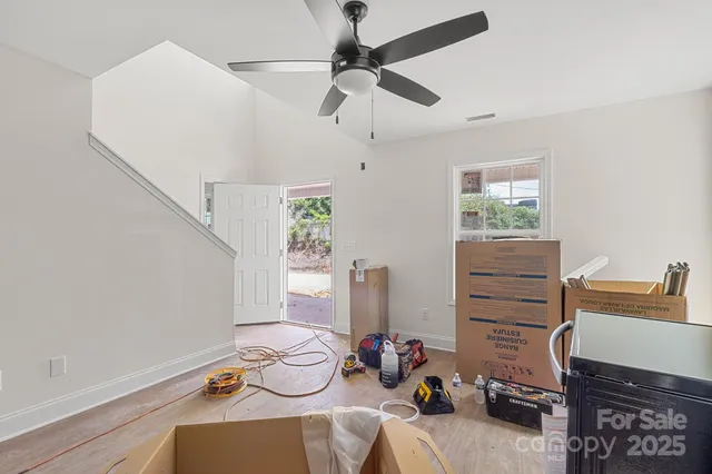 a view of a workspace with furniture