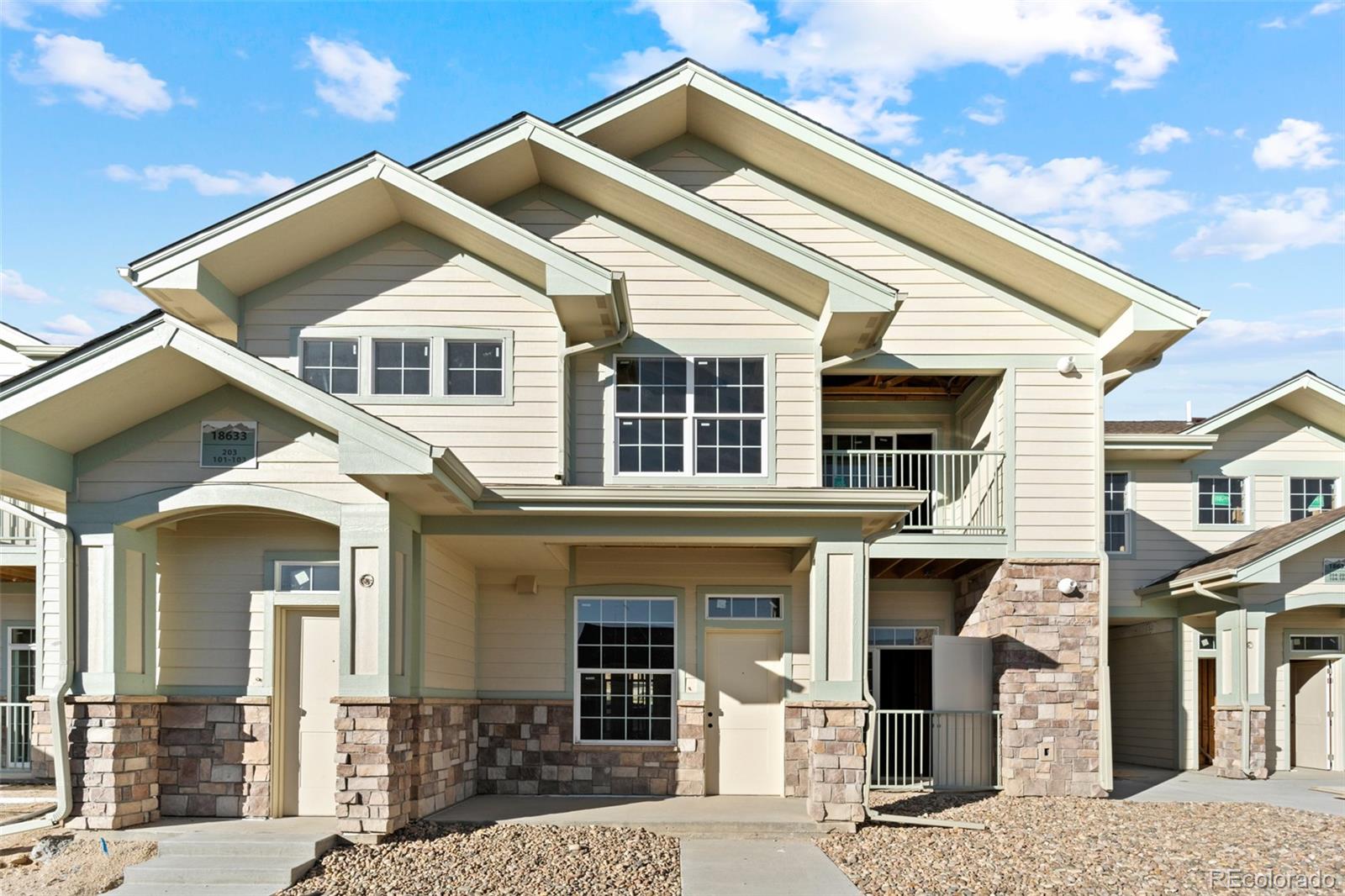 18633 Stroh Road, Unit 2104 Parker, CO 80134 - Photo 48 of 50 a front view of a house with glass windows