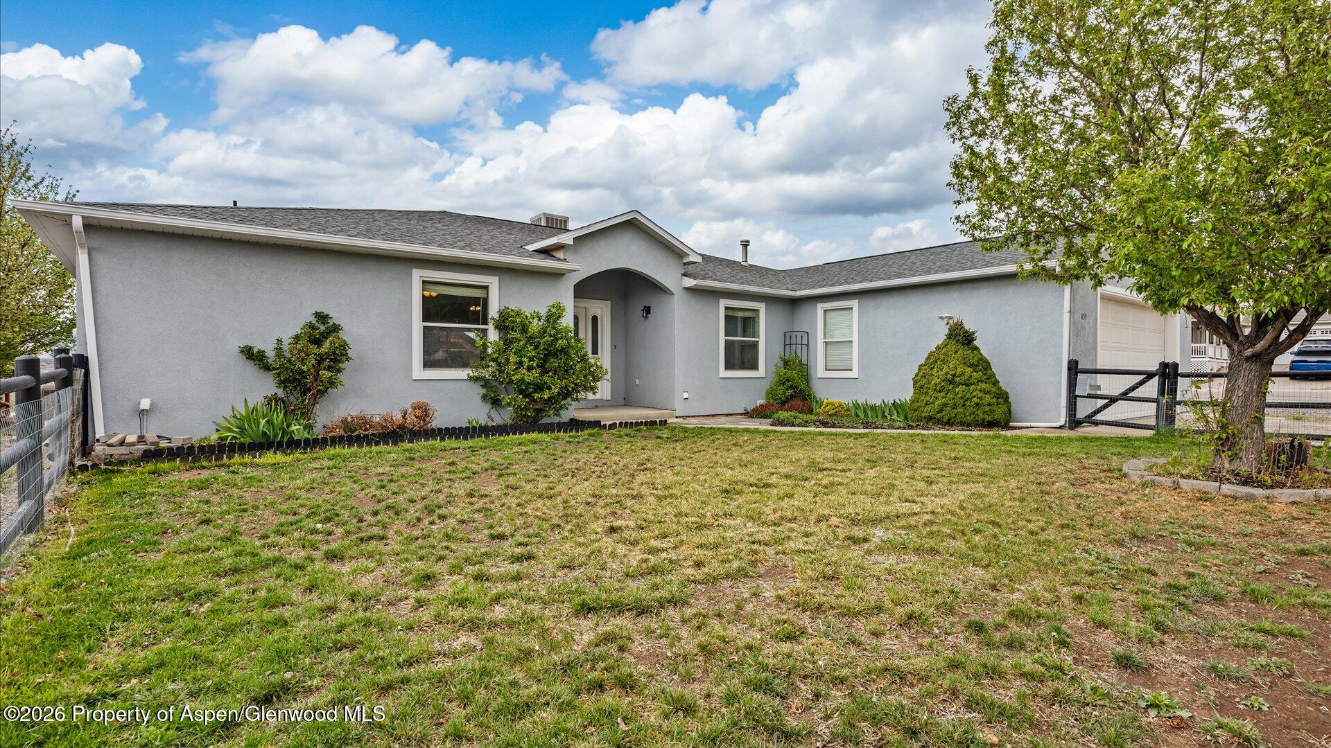 1459 Anvil View Avenue Rifle, CO 81650 - Photo 28 of 29 a front view of house with yard