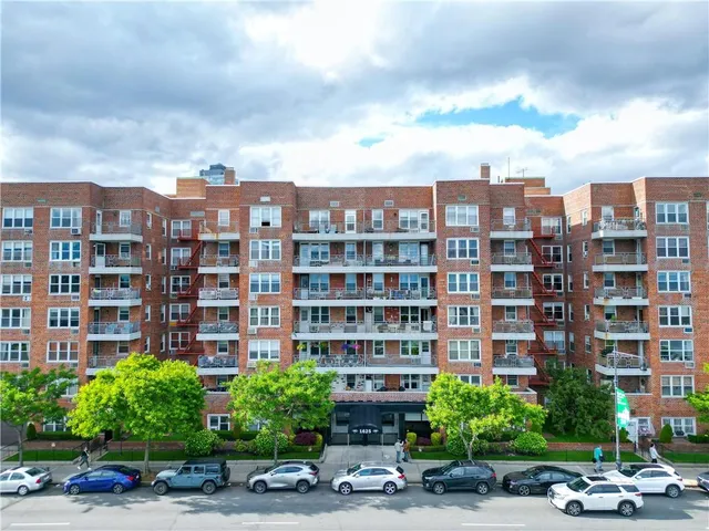 a front view of a building with street view