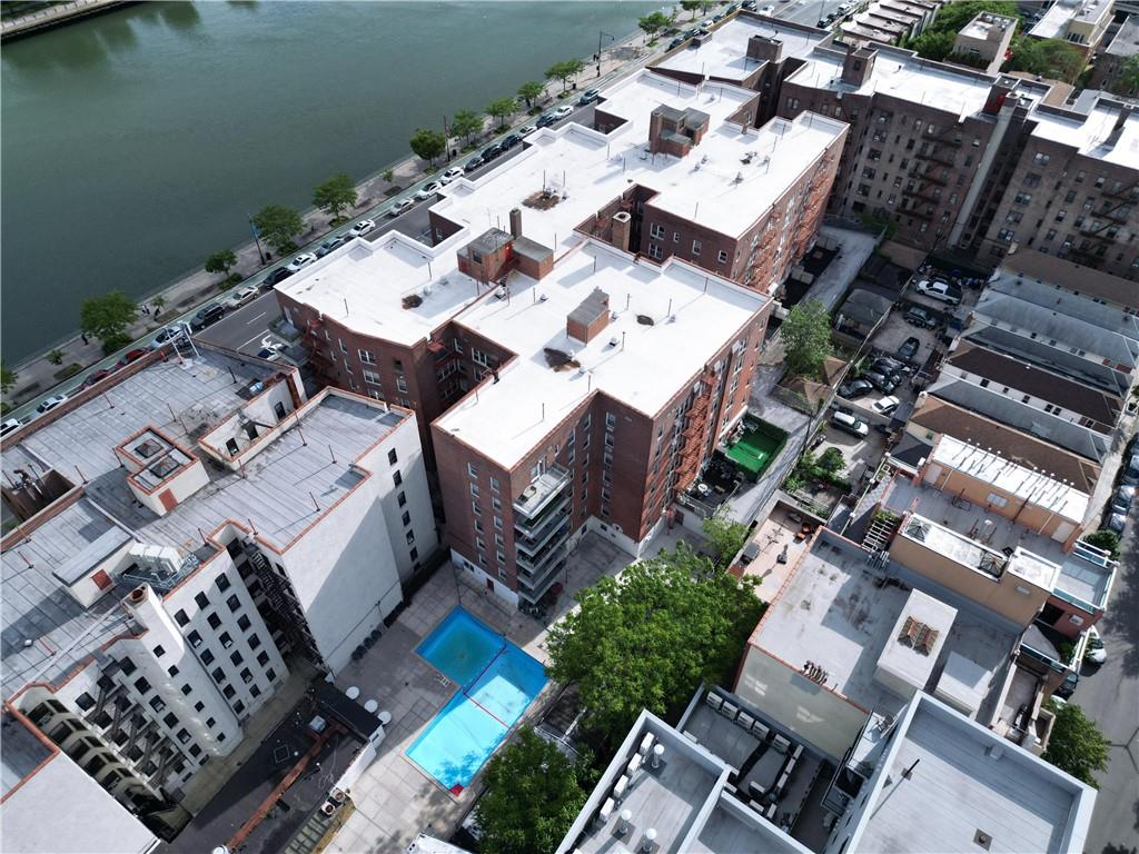 1625 Emmons Avenue, Unit 4N Brooklyn, NY 11235 - Photo 20 of 32 an aerial view of a house with garden space and street view