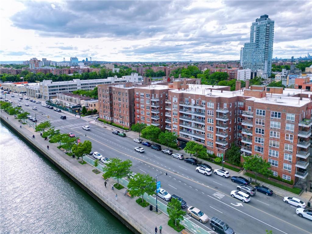 1625 Emmons Avenue, Unit 4N Brooklyn, NY 11235 - Photo 24 of 32 a city view with tall buildings