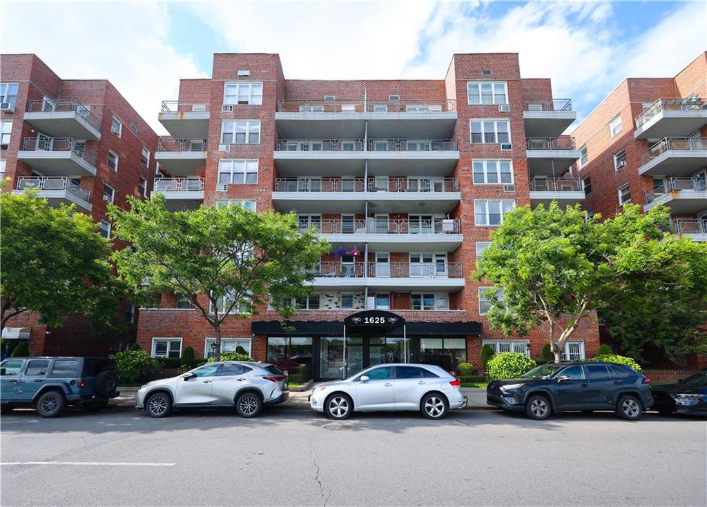 1625 Emmons Avenue, Unit 4N Brooklyn, NY 11235 - Photo 32 of 32 a car parked in front of a building