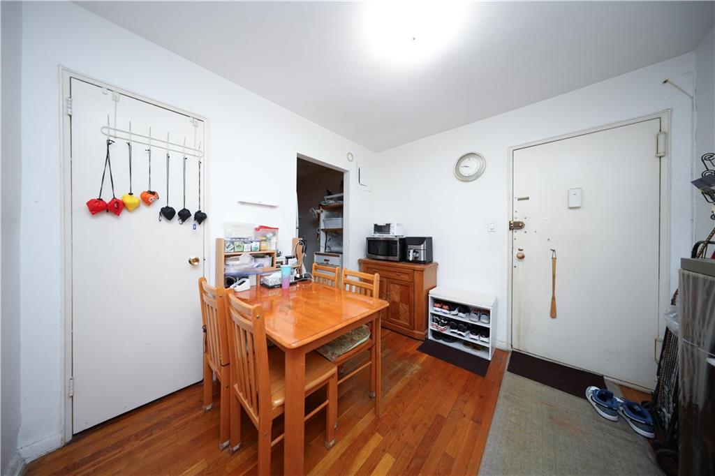 1625 Emmons Avenue, Unit 4N Brooklyn, NY 11235 - Photo 6 of 32 a dining room with furniture and wooden floor