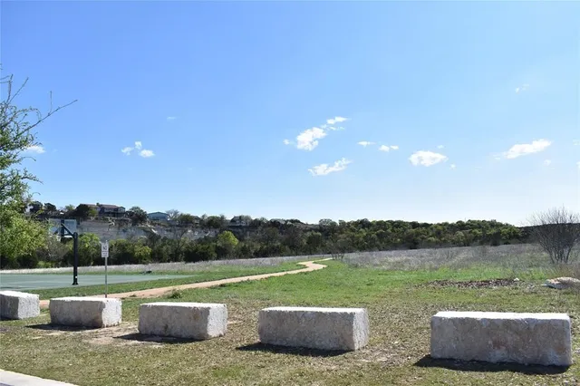 a view of a couches in patio and a yard