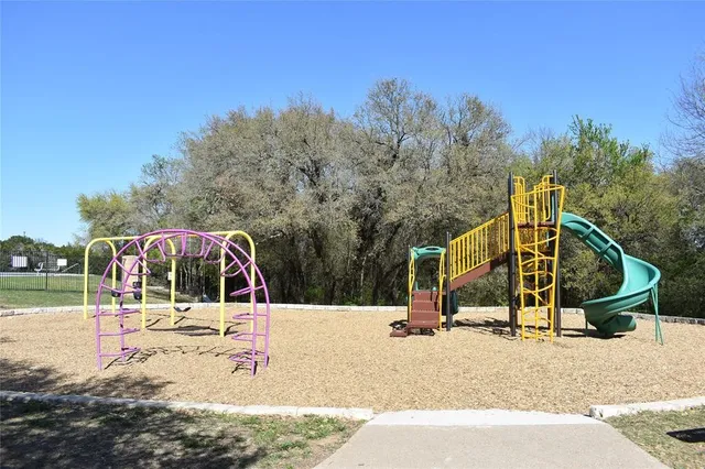 a view of a park with slide