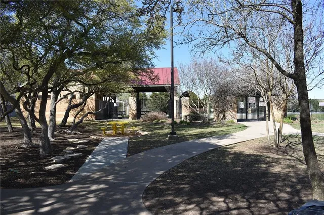 a sign board on the side of a road