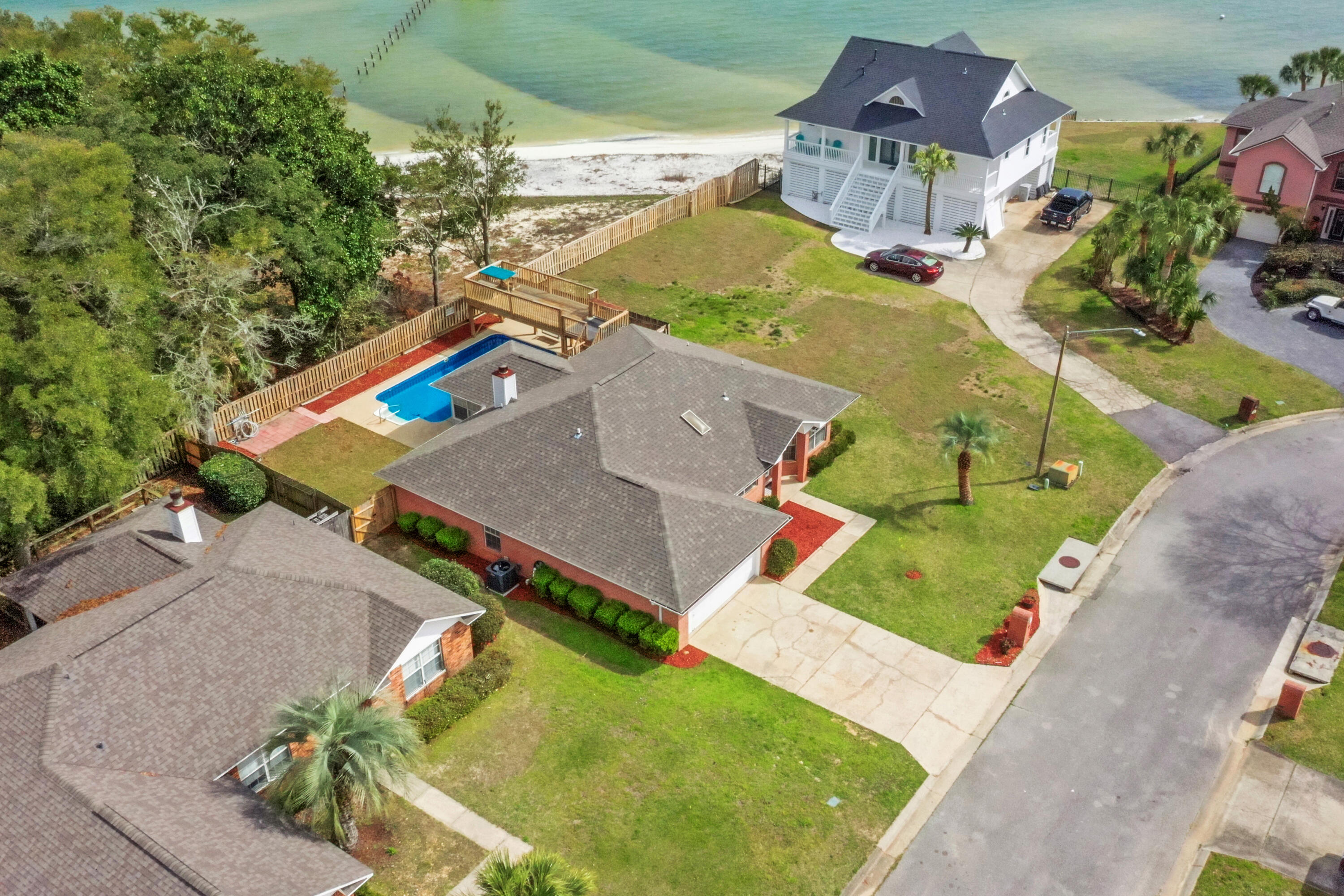 2001 Jessica Way Navarre, FL 32566 - Photo 2 of 73 an aerial view of a house with a swimming pool