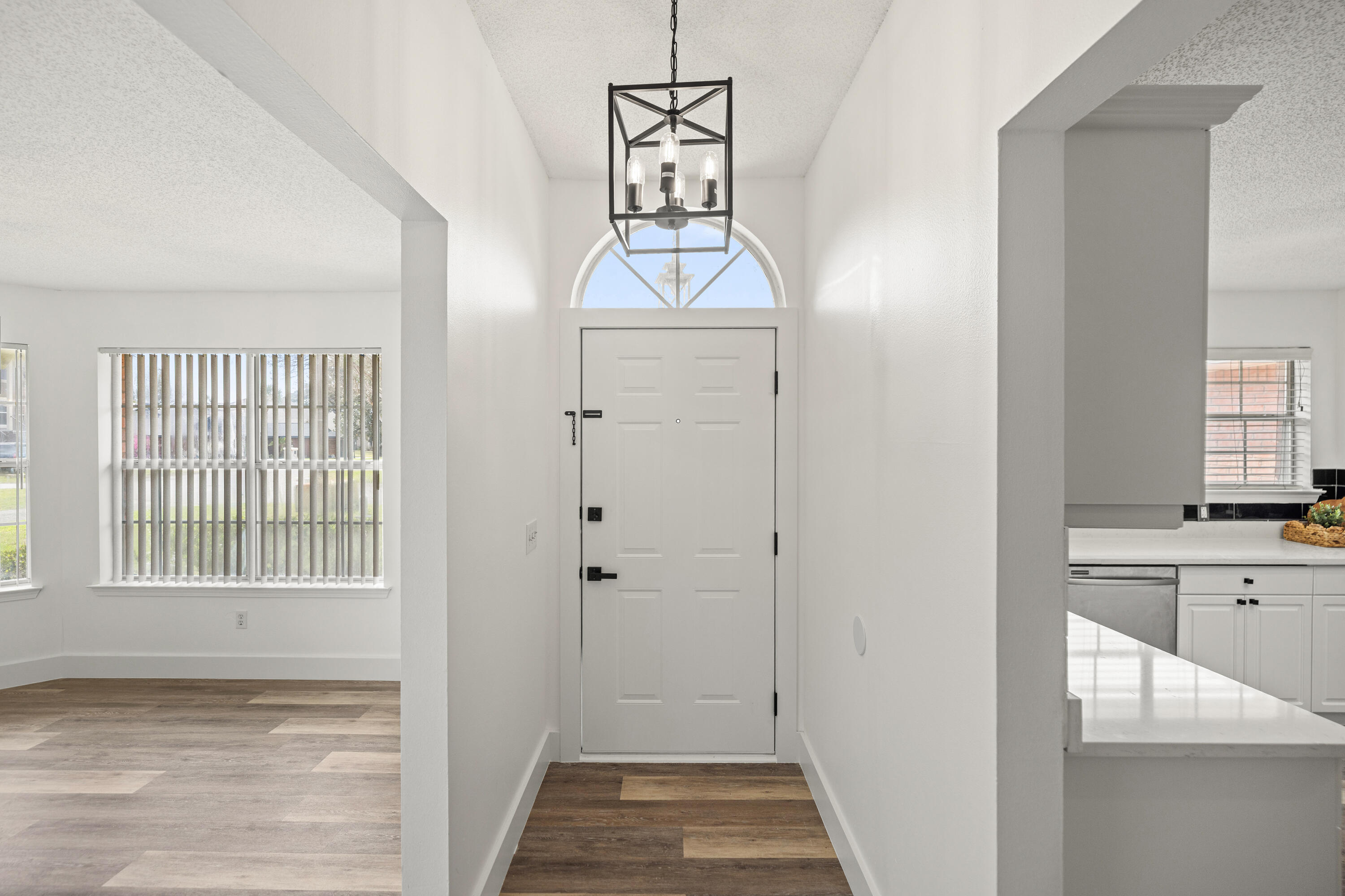 2001 Jessica Way Navarre, FL 32566 - Photo 22 of 73 a view of a hallway with windows