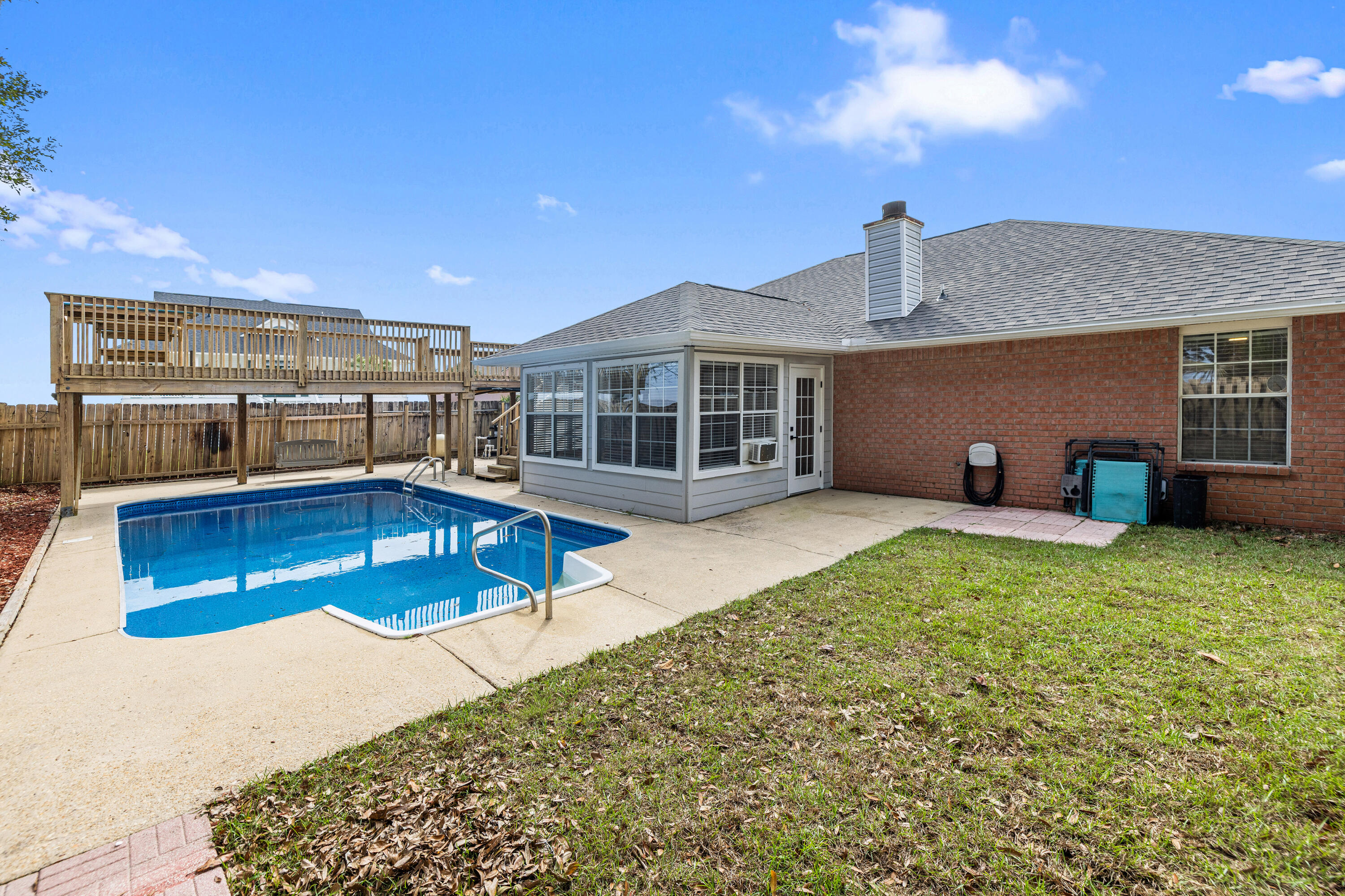2001 Jessica Way Navarre, FL 32566 - Photo 49 of 73 a view of a house with a swimming pool