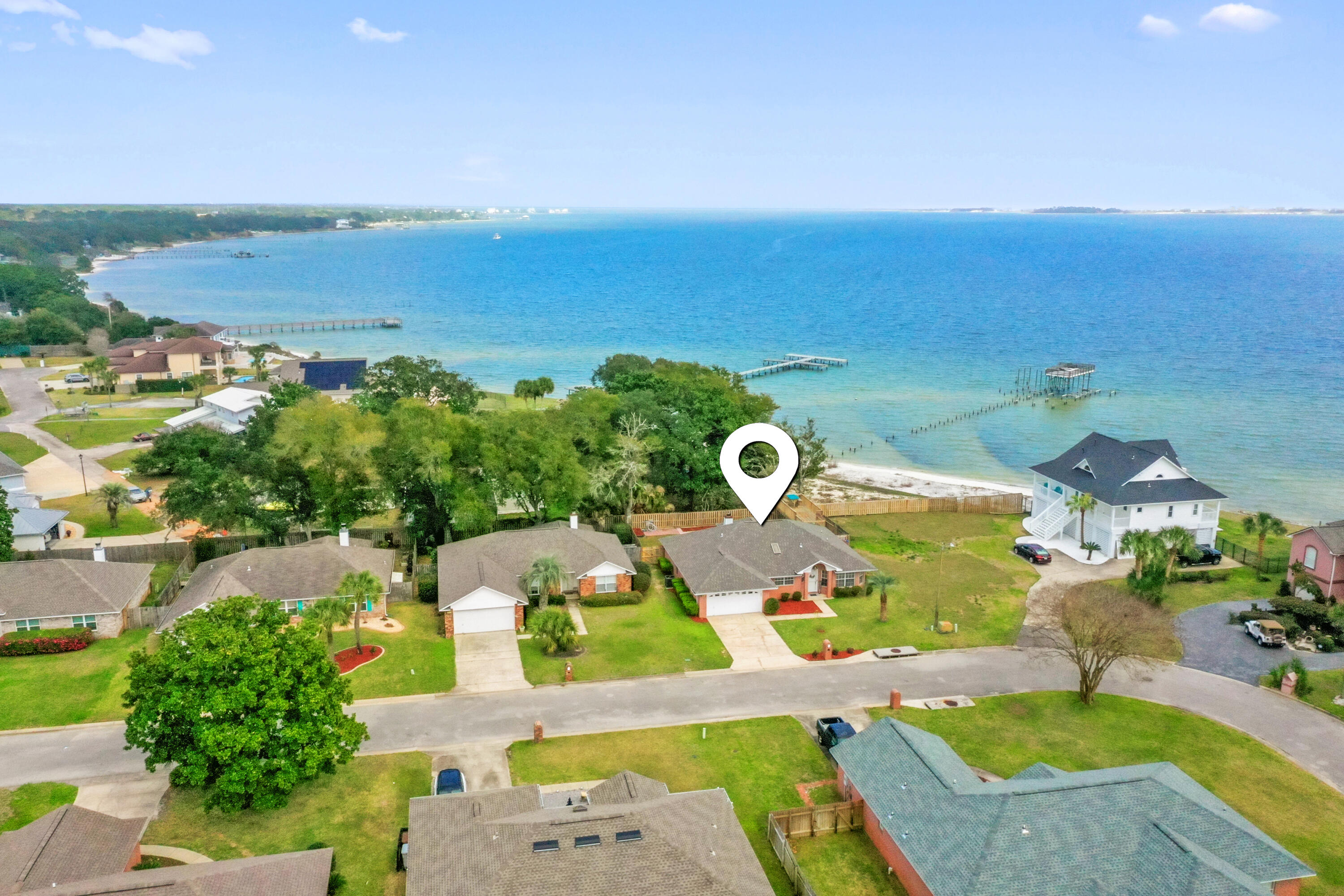 2001 Jessica Way Navarre, FL 32566 - Photo 60 of 73 an aerial view of a house with a garden