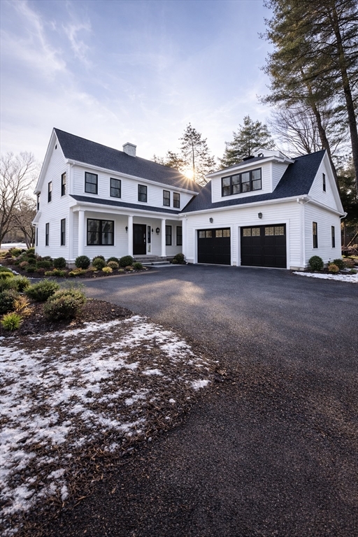 104 Eliot Street Natick, MA 01760 - Photo 1 of 7 a front view of a house with a yard