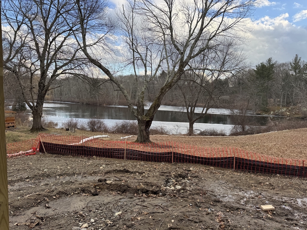 104 Eliot Street Natick, MA 01760 - Photo 2 of 7 a view of a yard with large trees