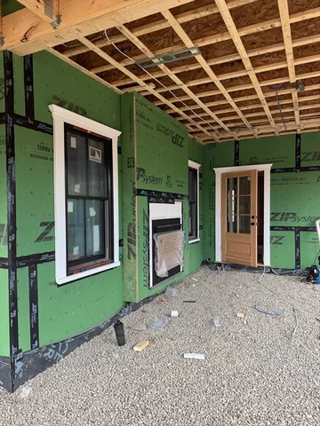 a view of a porch of a house