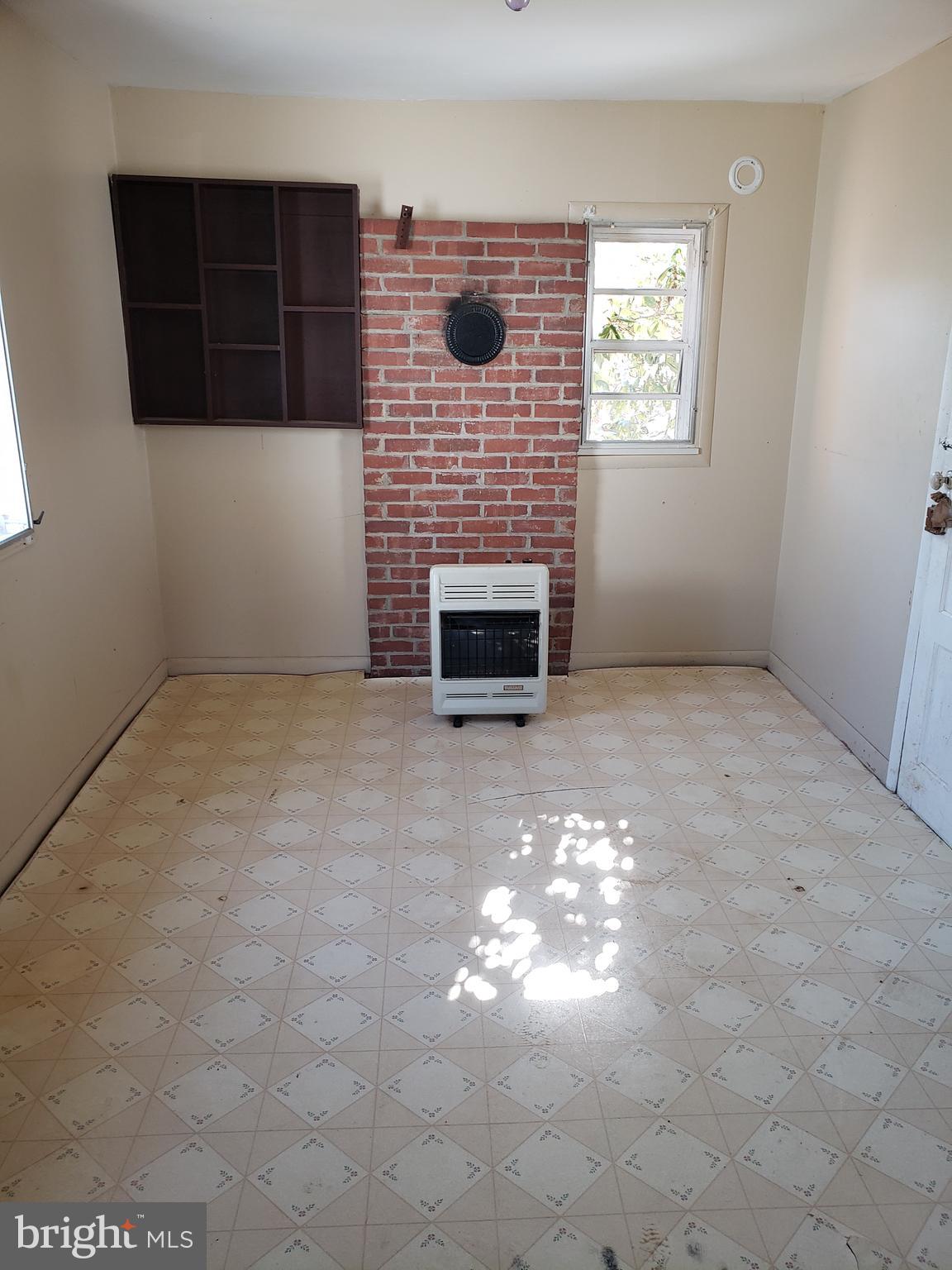 1718 Delp Road Whiteford, MD 21160 - Photo 11 of 30 a view of empty room with a fireplace