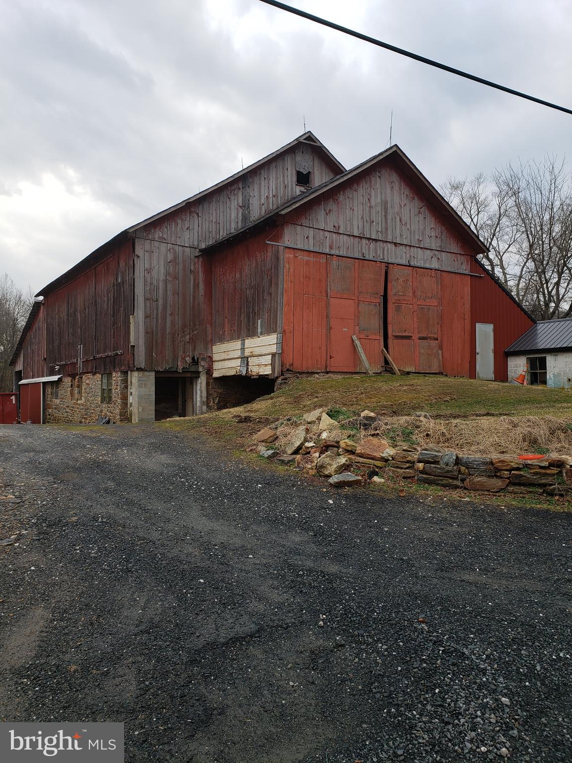 1718 Delp Road Whiteford, MD 21160 - Photo 6 of 30 a view of a house with backyard and wooden fence