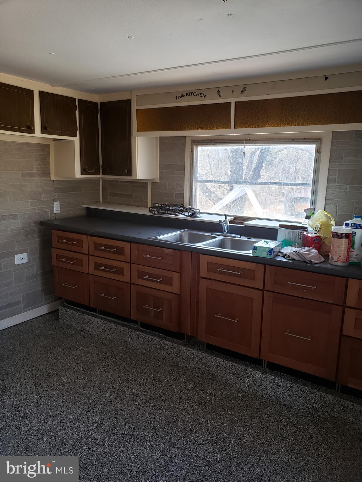 1718 Delp Road Whiteford, MD 21160 - Photo 9 of 30 a kitchen with stainless steel appliances granite countertop a sink and cabinets