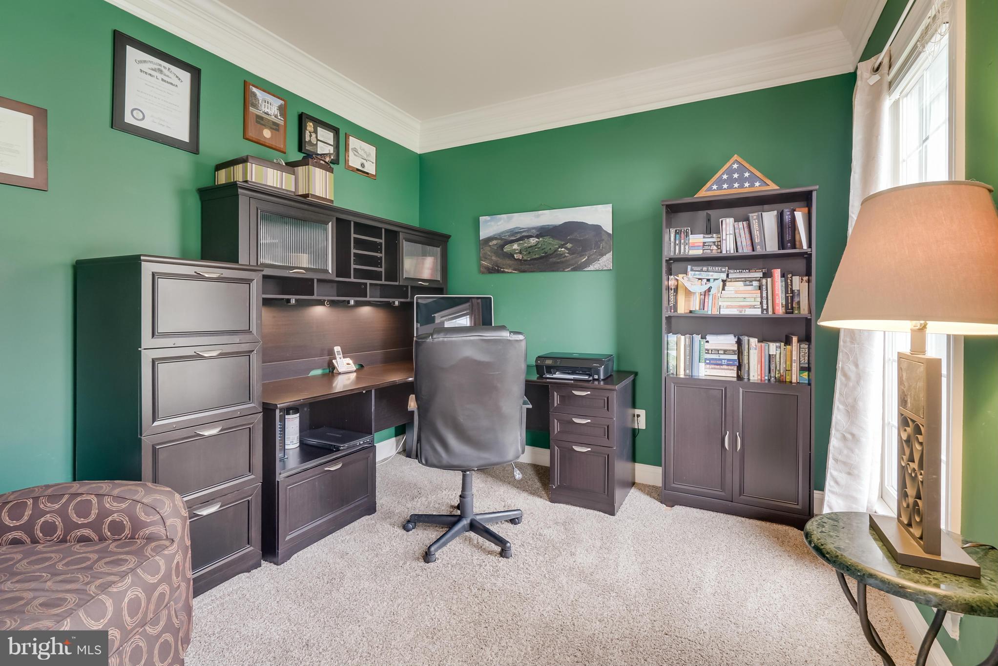 8759 Center Road Springfield, VA 22152 - Photo 23 of 30 a workspace with furniture and a window