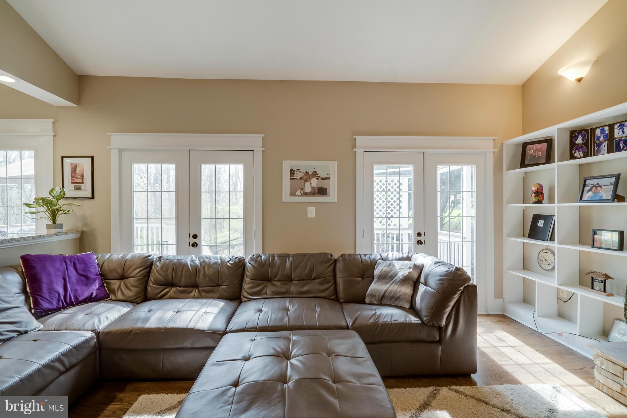 8759 Center Road Springfield, VA 22152 - Photo 9 of 30 a living room with furniture and a couch