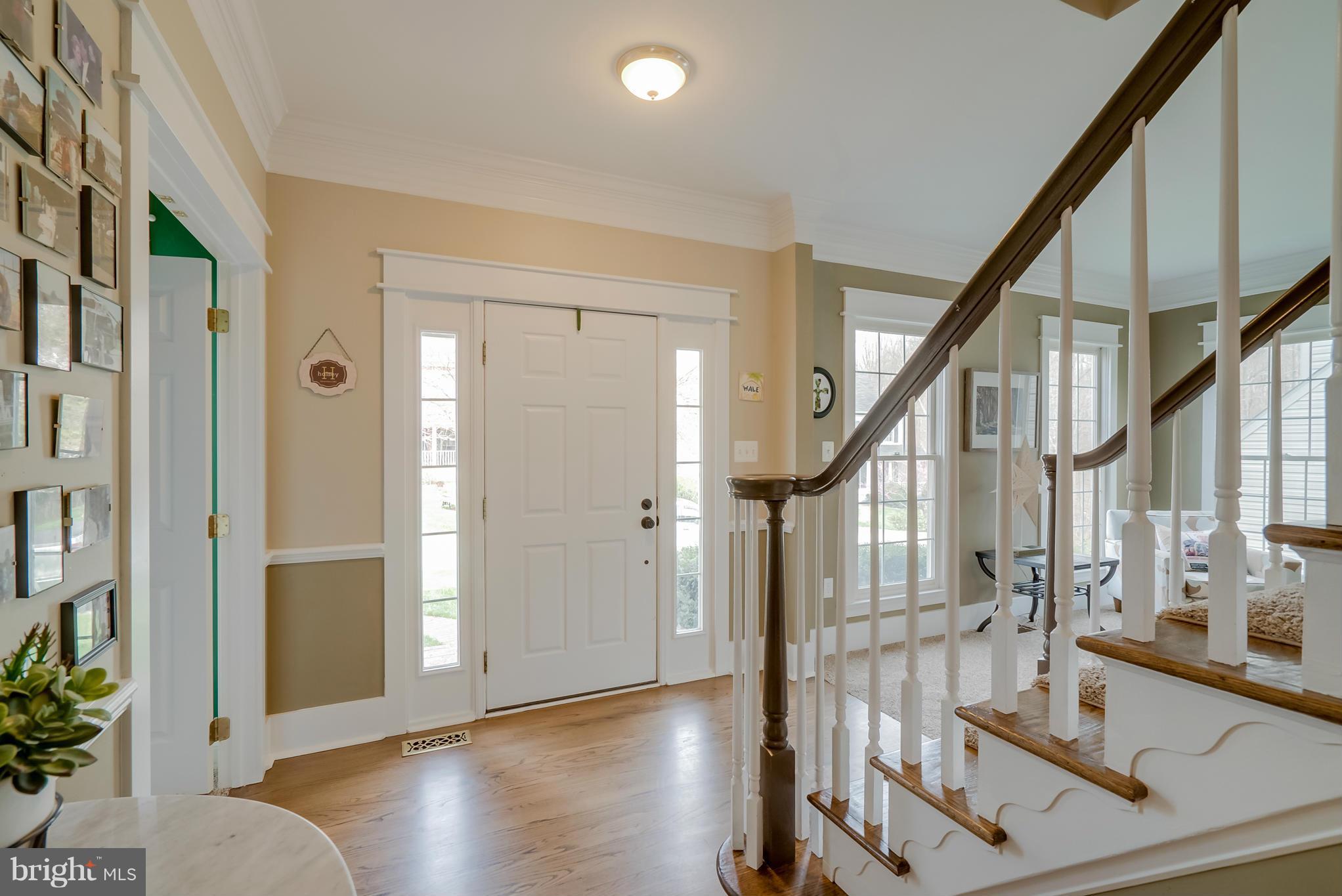 8759 Center Road Springfield, VA 22152 - Photo 10 of 30 a view of front door with stairs