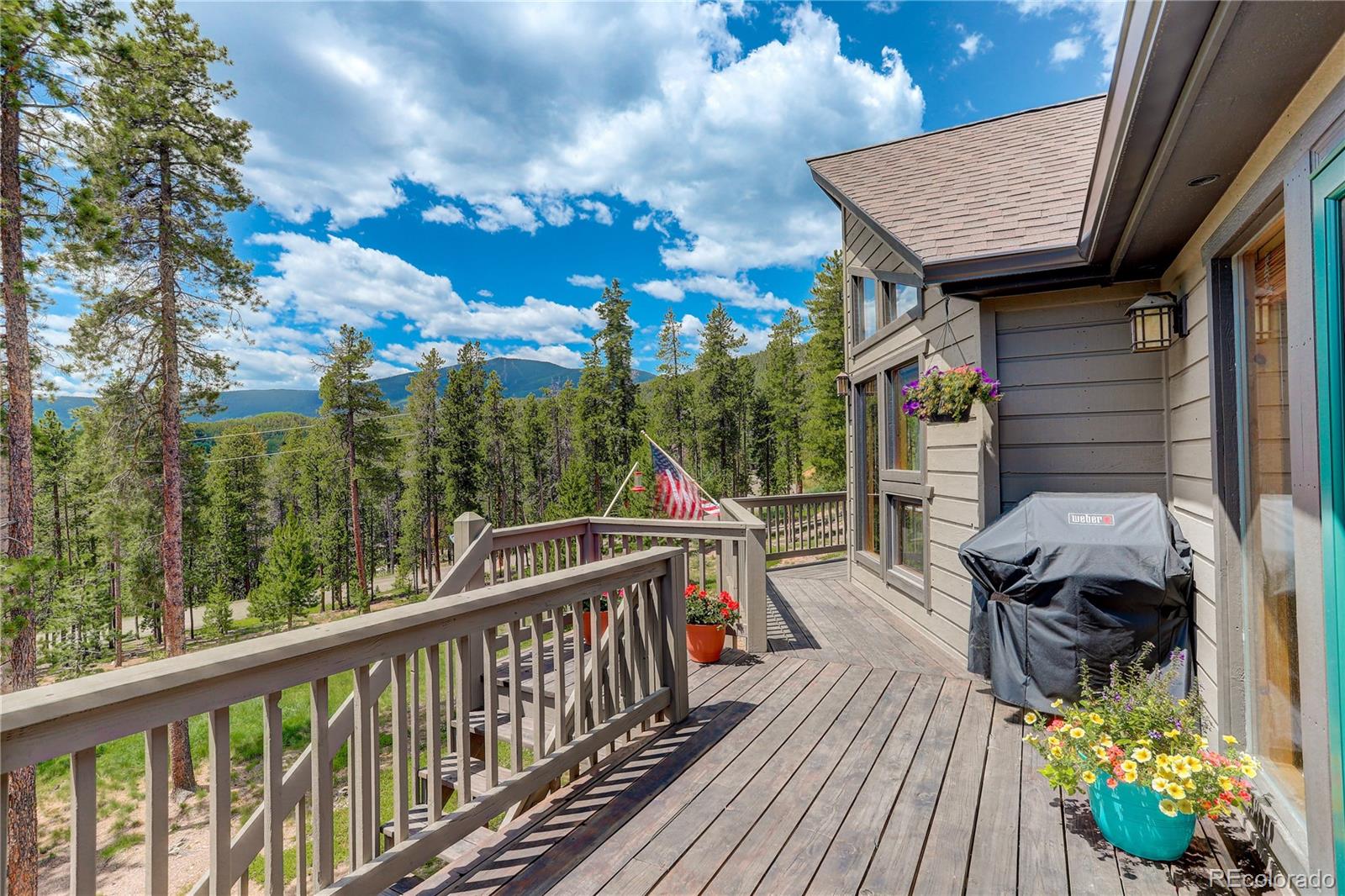 8360 South Warhawk Road Conifer, CO 80433 - Photo 5 of 40 a view of a balcony with furniture