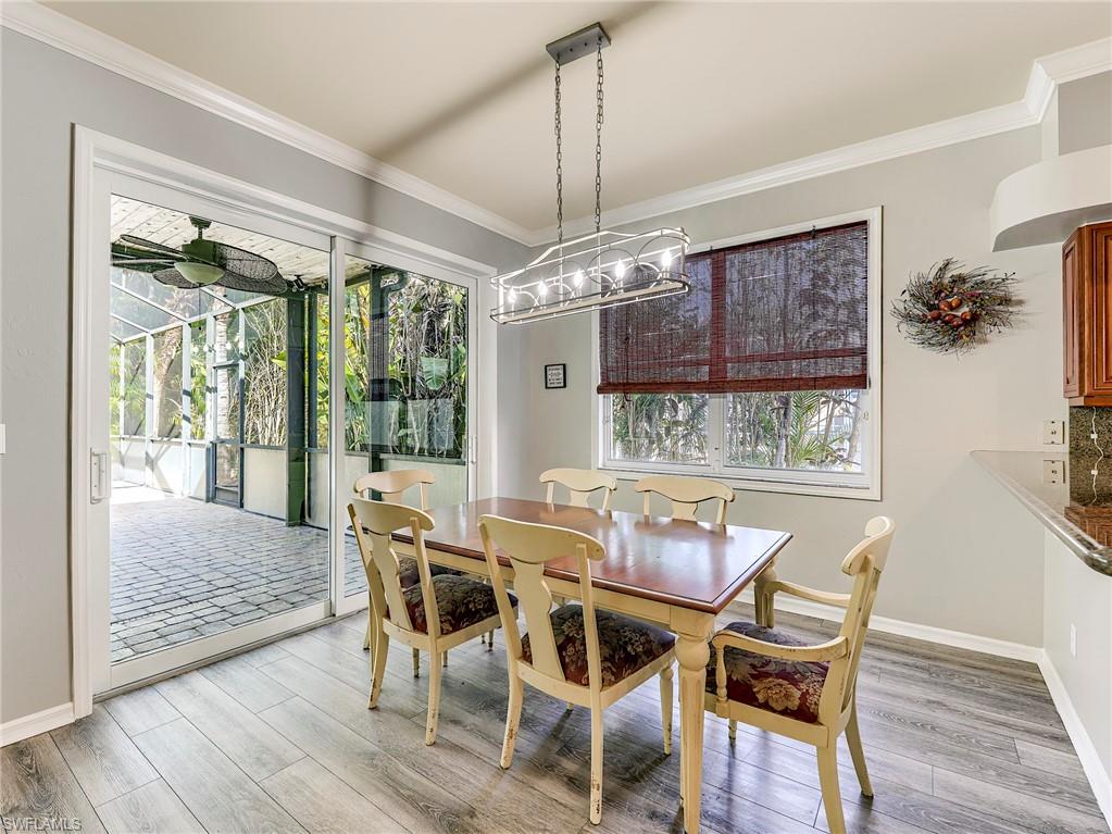 21281 Braxfield Loop Estero, FL 33928 - Photo 12 of 42 a view of a dining room with furniture window and outside view