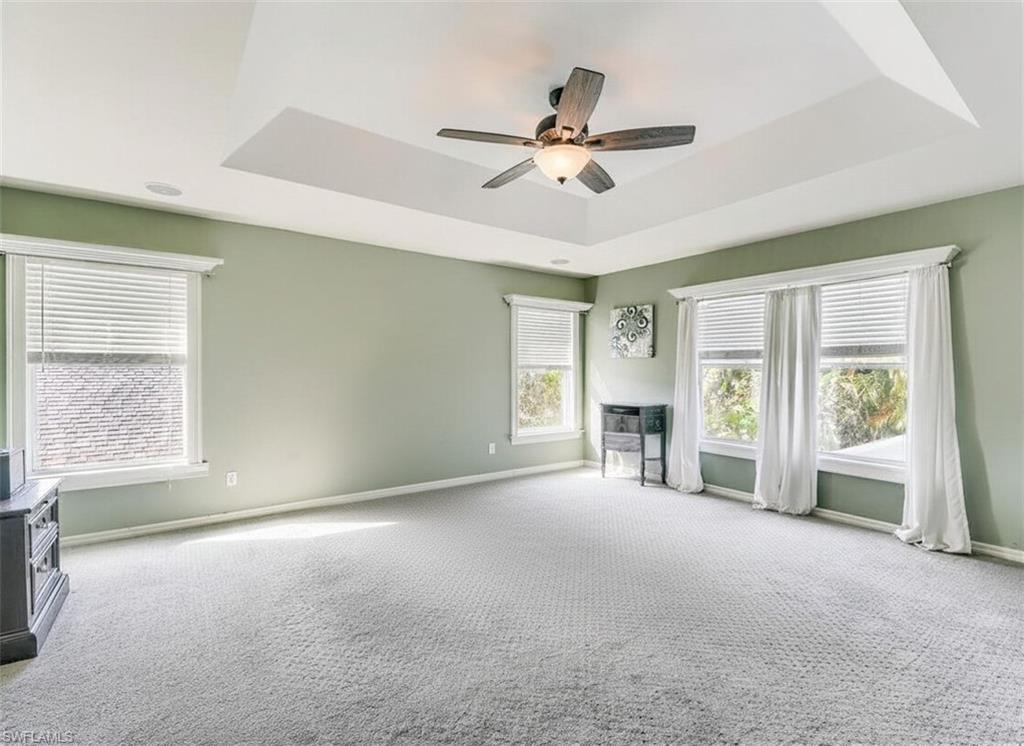 21281 Braxfield Loop Estero, FL 33928 - Photo 18 of 42 a view of a livingroom with a ceiling fan and window