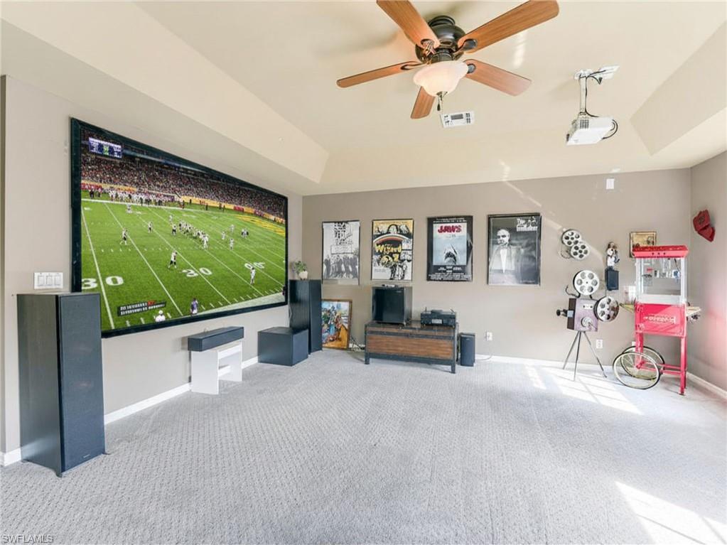 21281 Braxfield Loop Estero, FL 33928 - Photo 24 of 42 a reading room with furniture and a floor to ceiling window