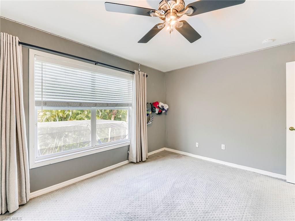 21281 Braxfield Loop Estero, FL 33928 - Photo 27 of 42 a view of an empty room with a window