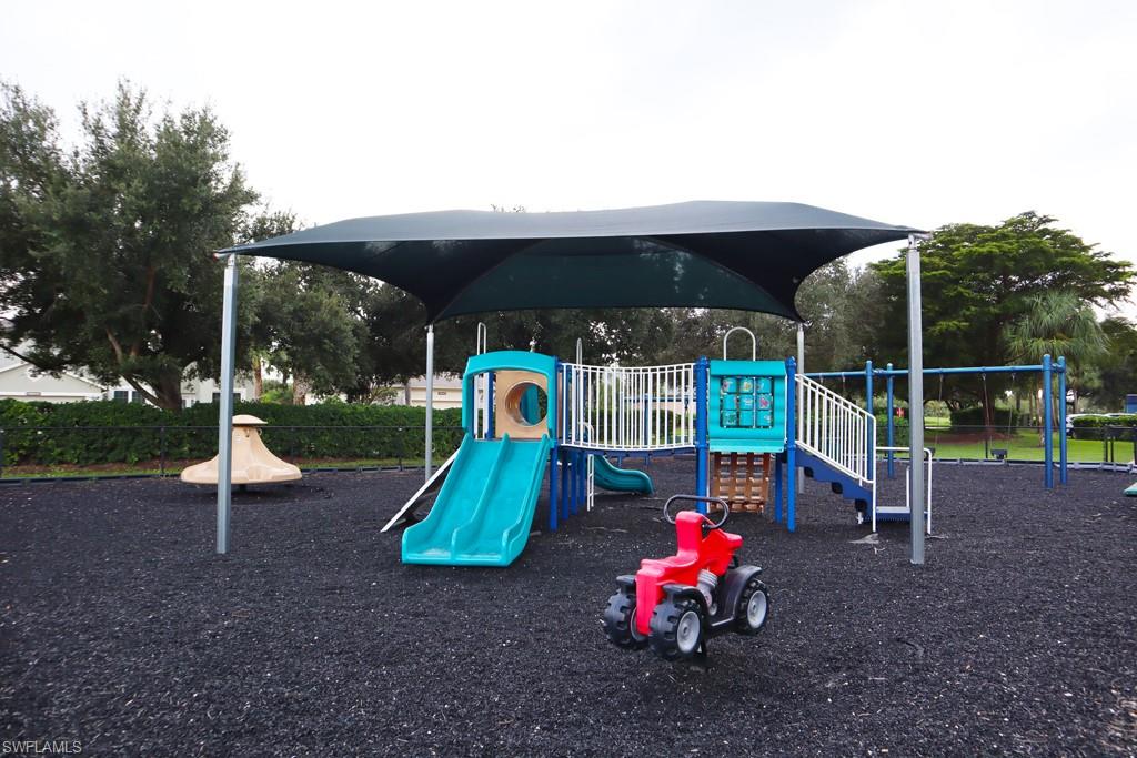 21281 Braxfield Loop Estero, FL 33928 - Photo 42 of 42 a childrens park with lots of swings and slides