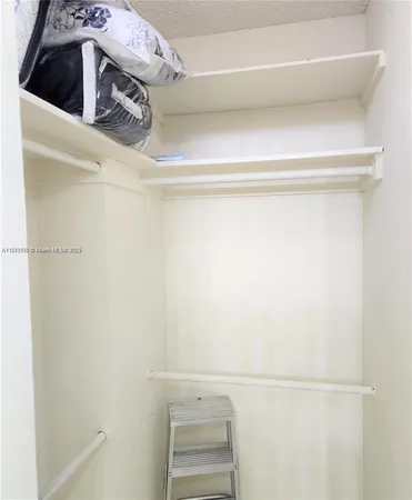 a close up view of walk in closet