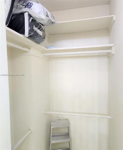 a close up view of walk in closet