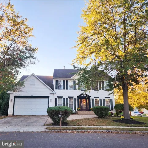 front view of a house with a street