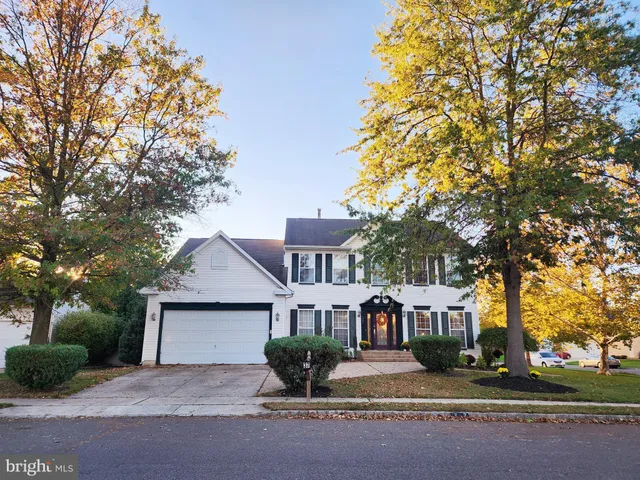 front view of a house with a street