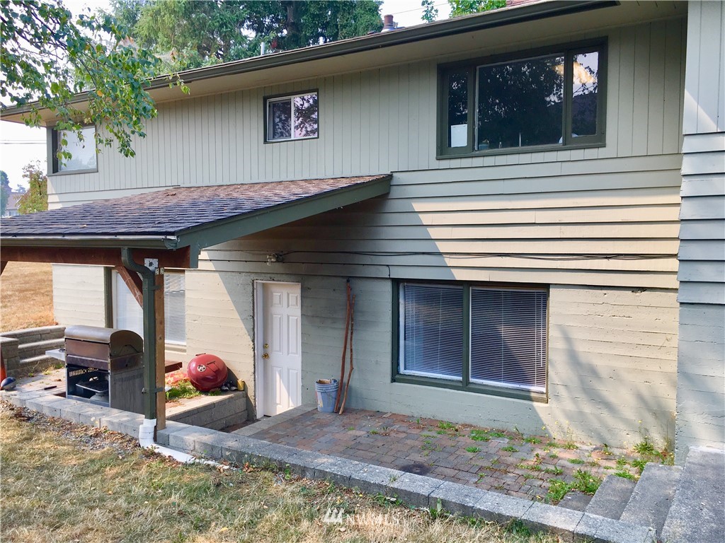 428 North Laventure Road Mount Vernon, WA 98273 - Photo 16 of 24 a view of a house with a porch and furniture