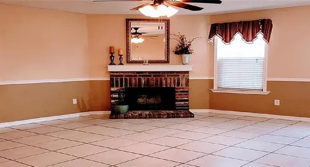 a living room with a fireplace