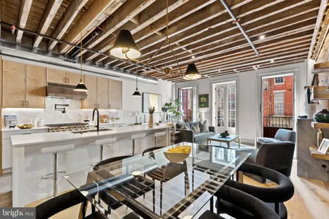 a very nice looking kitchen with a large window
