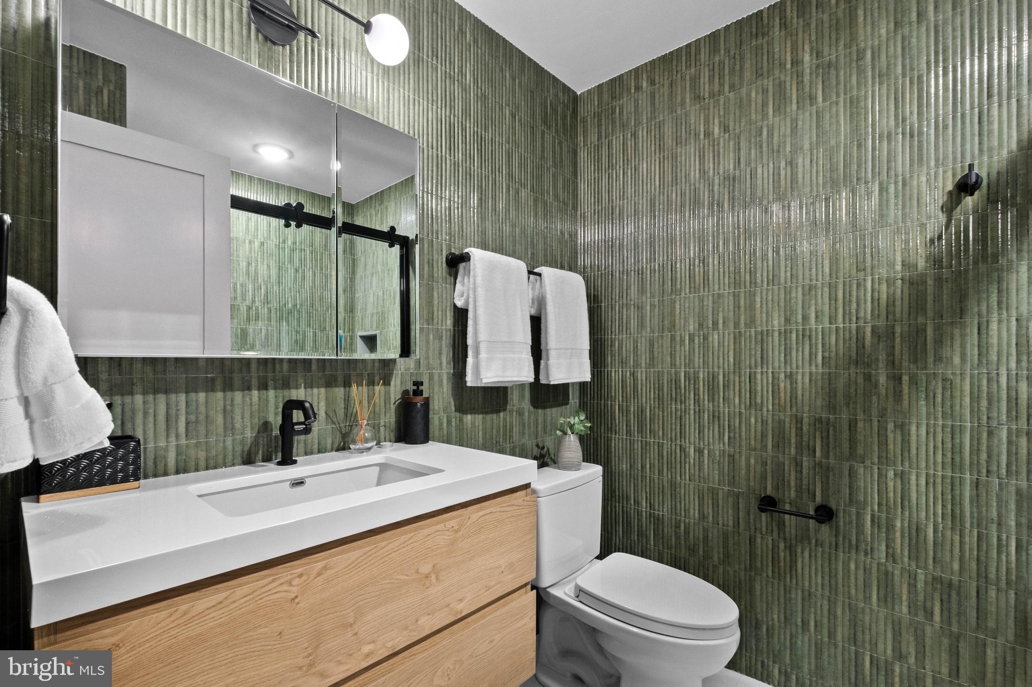 151 North 3rd Street, Unit 2 Philadelphia, PA 19106 - Photo 31 of 45 a bathroom with a sink toilet and shower