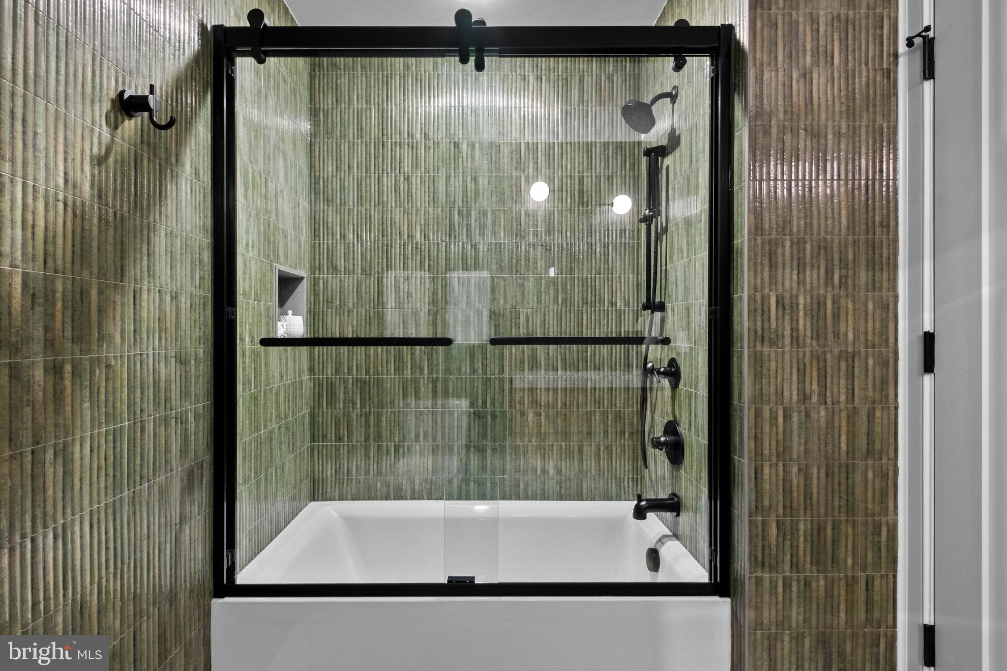 151 North 3rd Street, Unit 2 Philadelphia, PA 19106 - Photo 32 of 45 a bathroom with a glass shower door