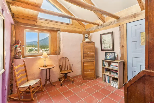 a bathroom with a bathtub and toilet